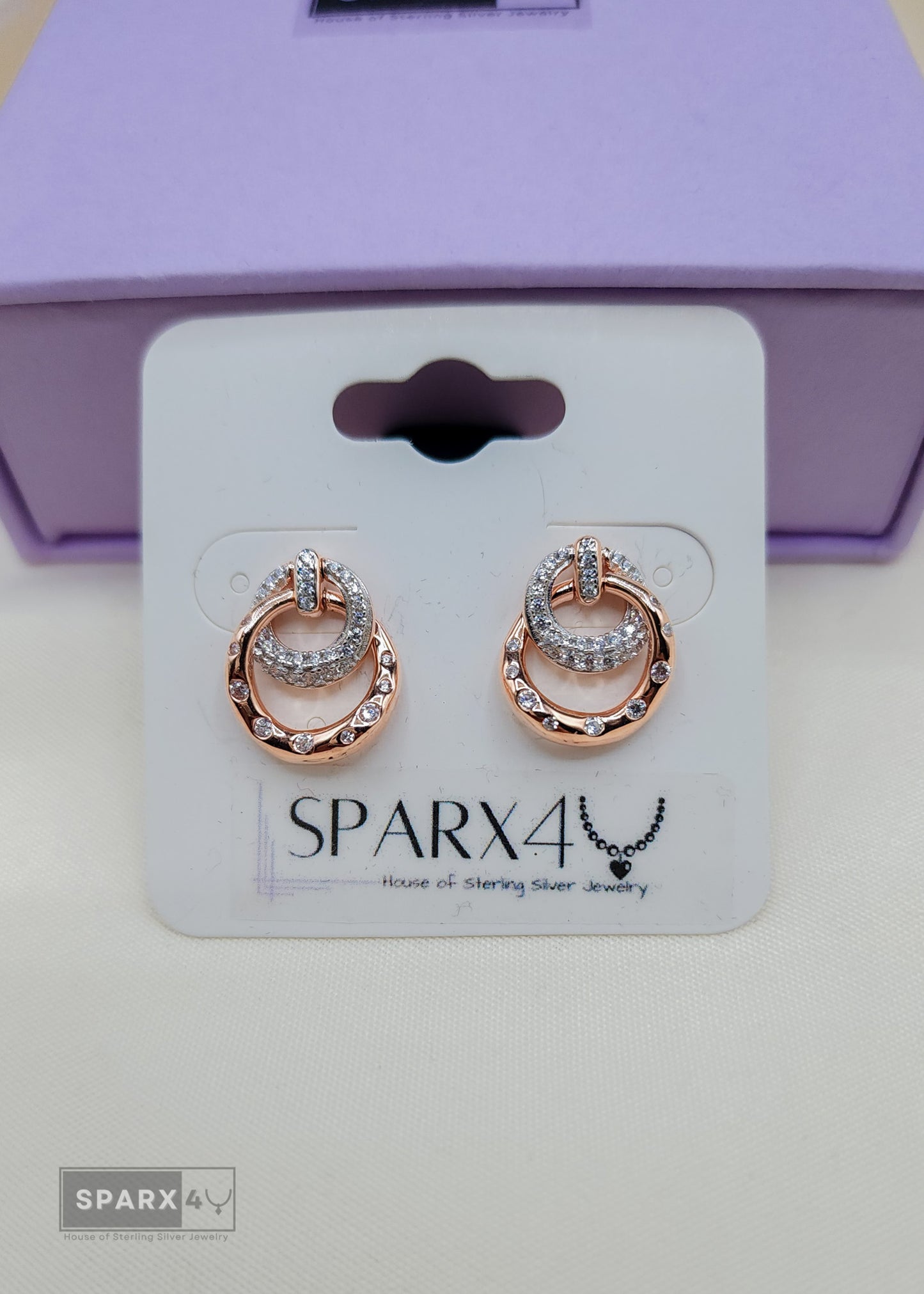 ROSE SWIRLED STUD EARRINGS