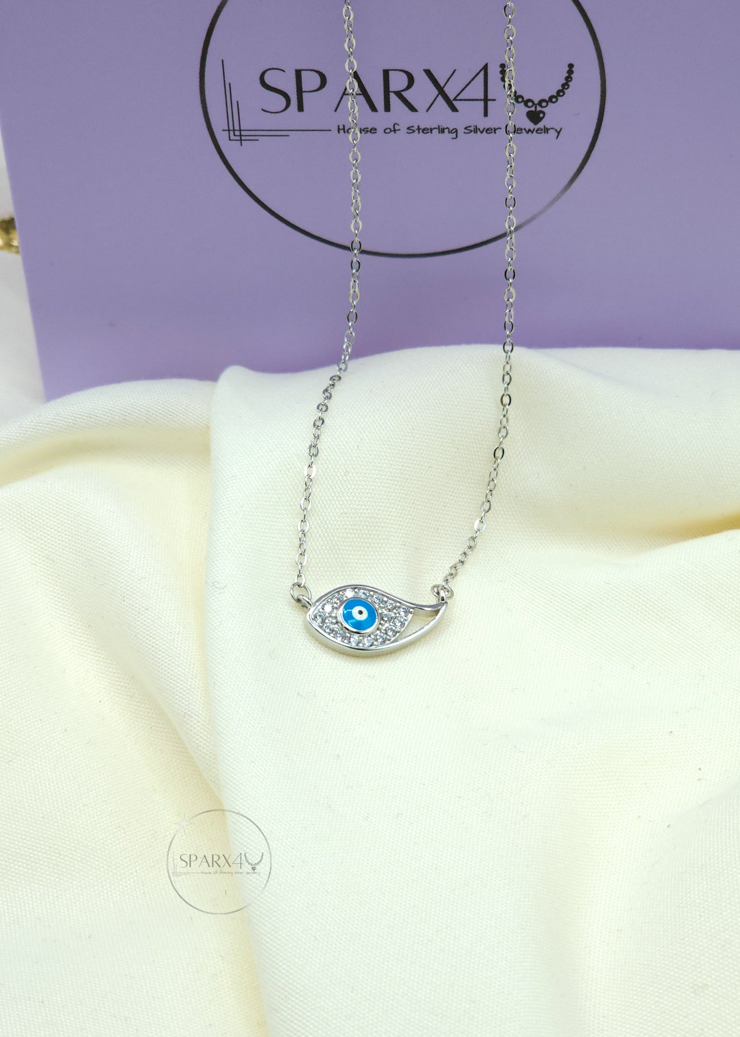 WINGED EVIL EYE NECKLACE