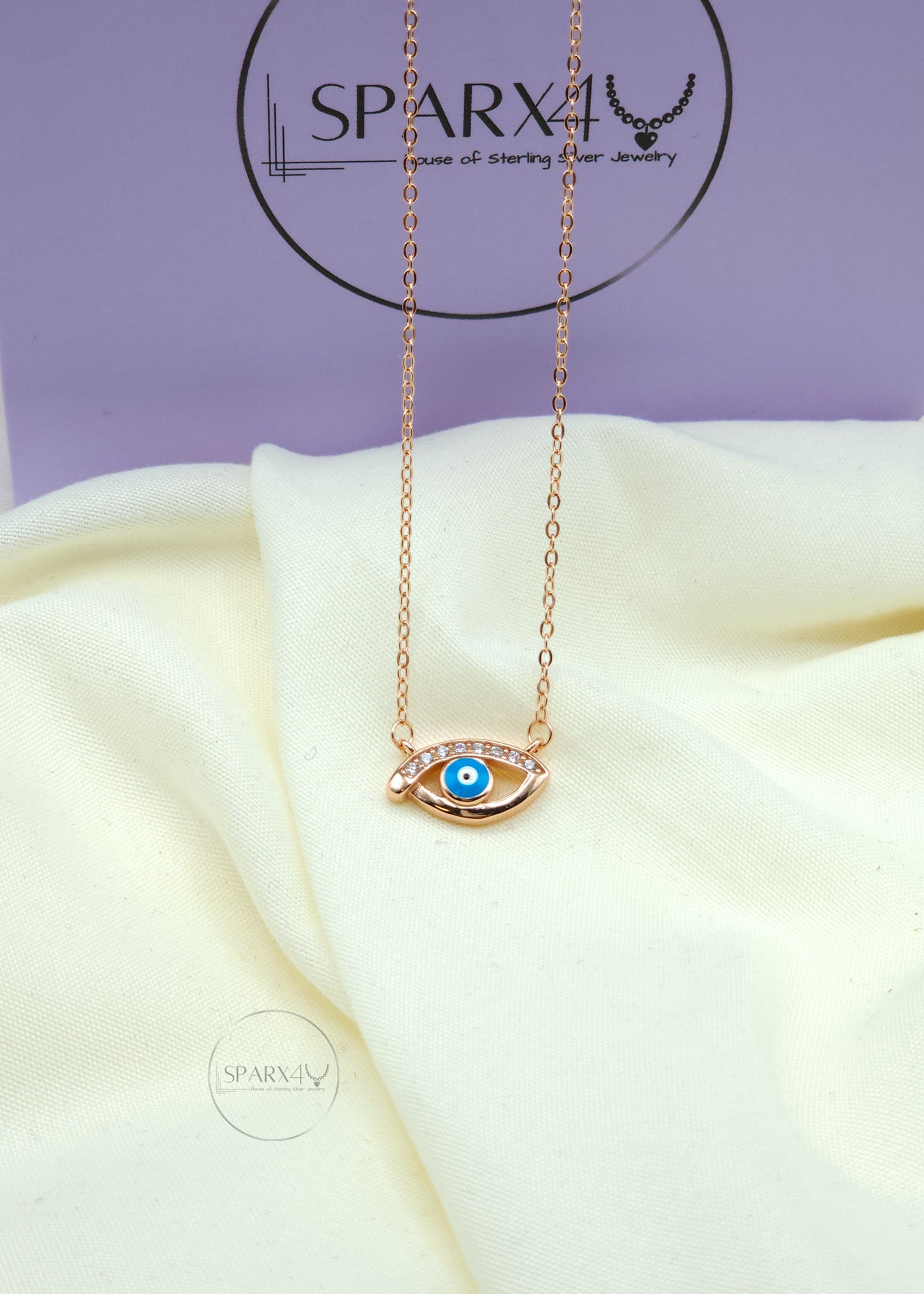 ROSE GLOW EVIL EYE NECKLACE