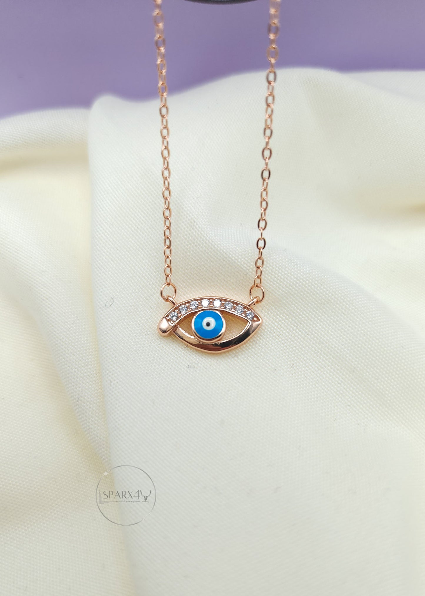 ROSE GLOW EVIL EYE NECKLACE